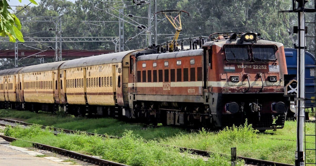 IRCTC ticket booking interface showing rescheduling option on mobile phone