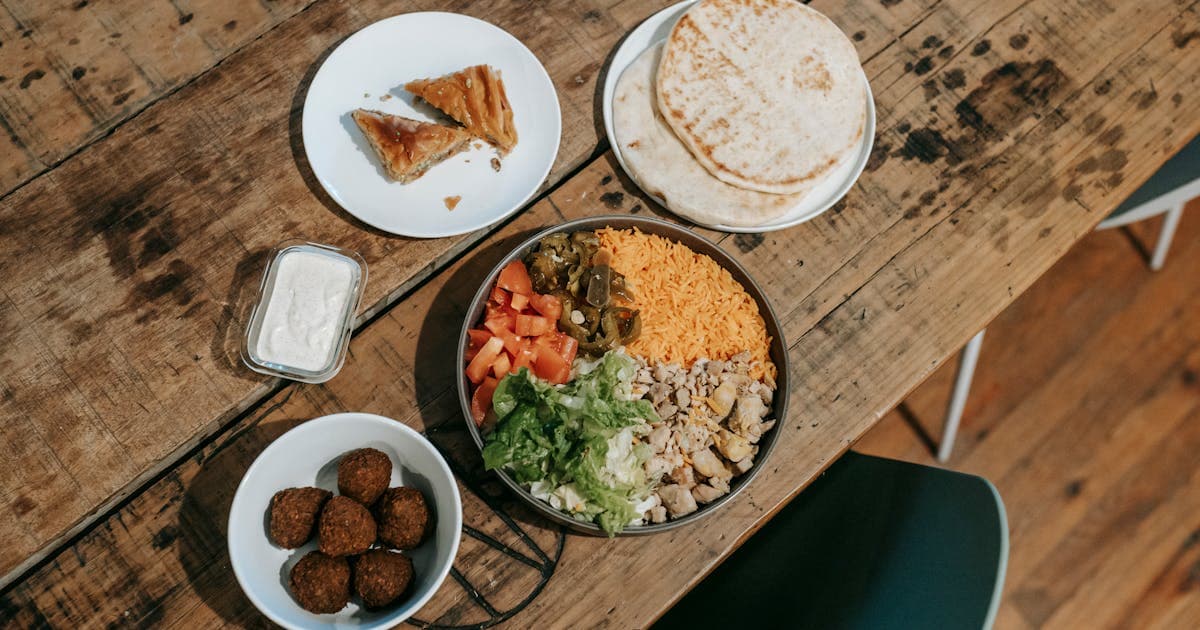 Traditional Indian dishes served on a table representing train food ordering
