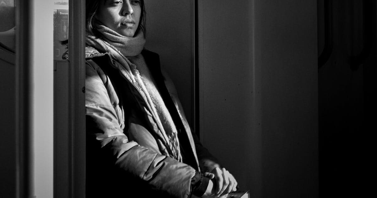 Passenger sitting inside an Indian train compartment