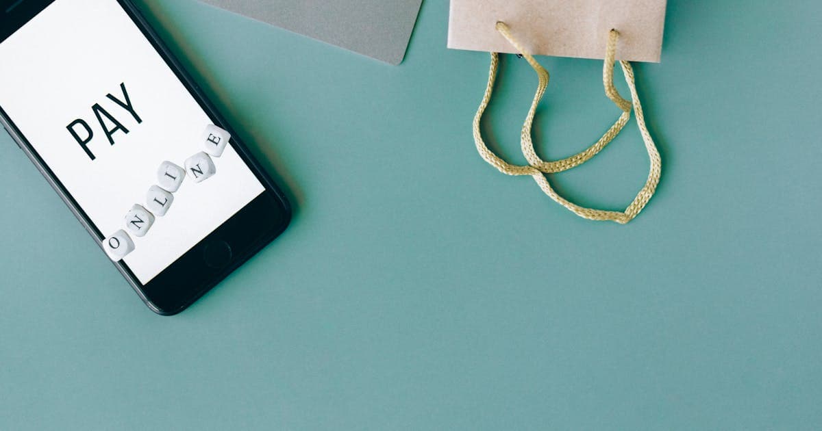 Online payment illustration with smartphone and credit card
